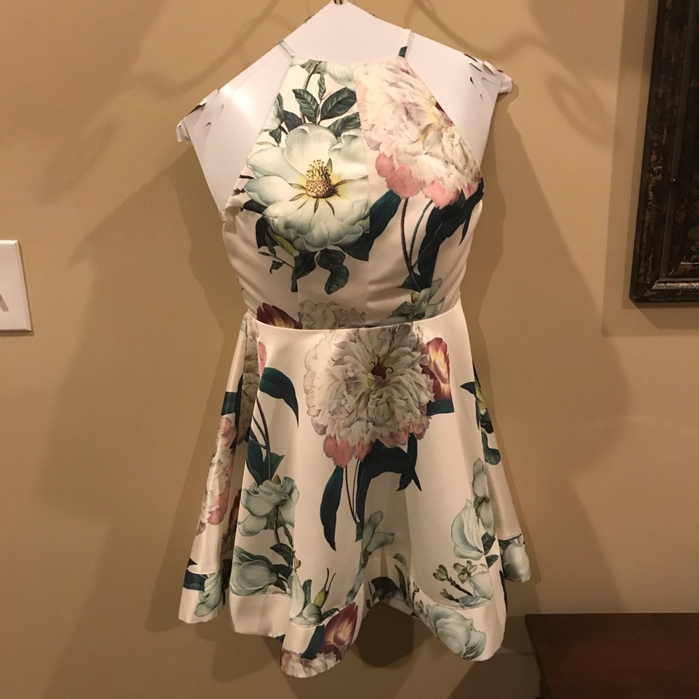 Only worn 1x. Floral satin backless dress